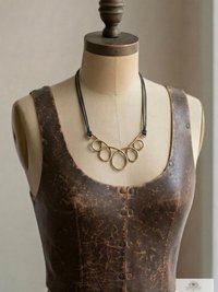 https://www.etsy.com/listing/1859016607/boho-leather-silver-choker-bead-necklace?
