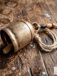 Handmade Etched Copper Bell with Jute Cord: Artisan-made Boho Wall Hanging
