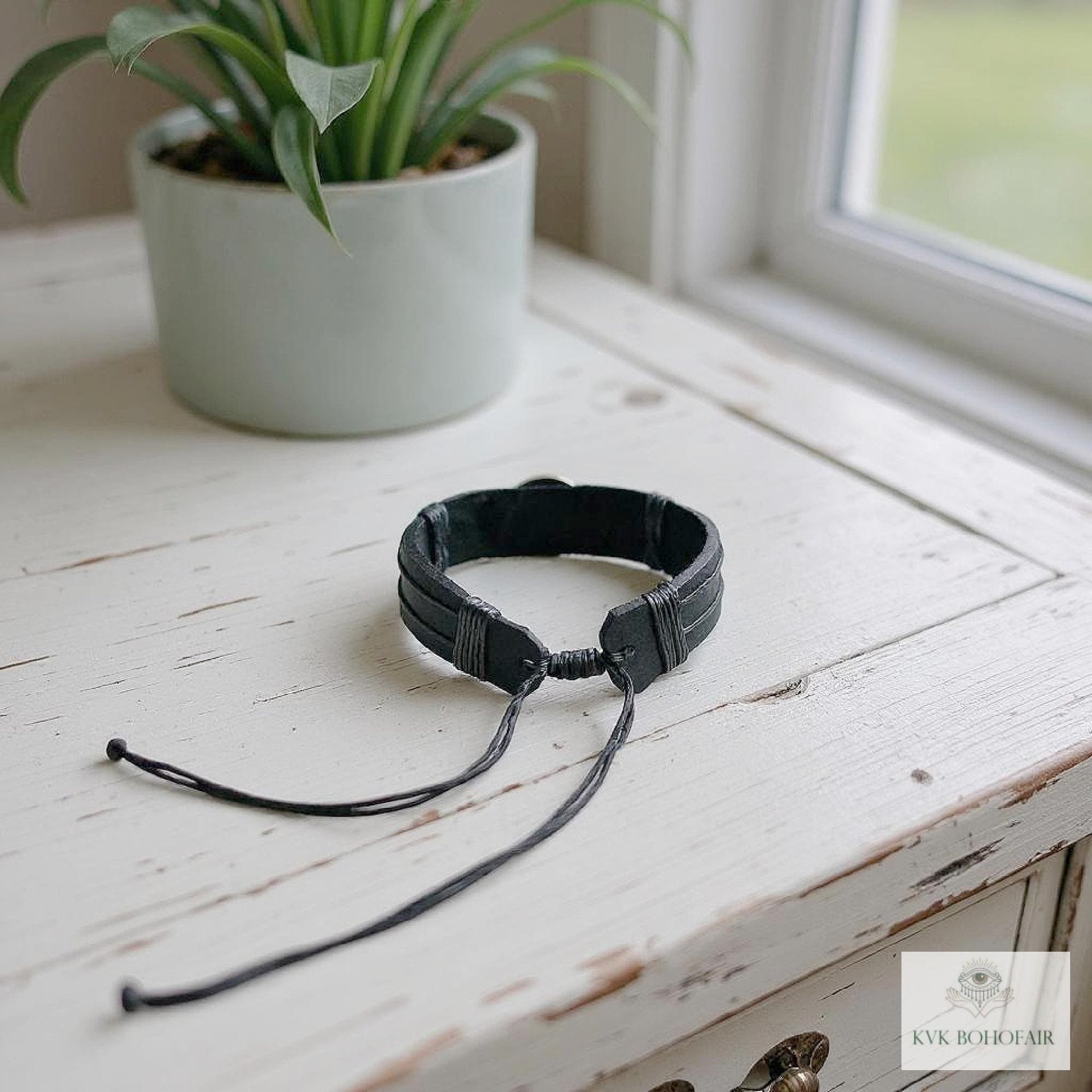 Handcrafted Coin Bracelet from Guatemala - Adjustable Black Leather Cuff